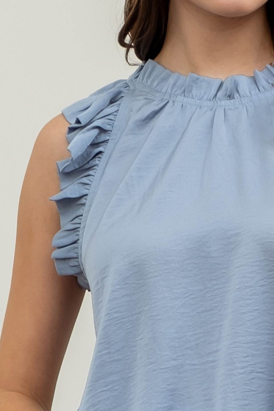 Sleeveless Ruffle Trim Blouse