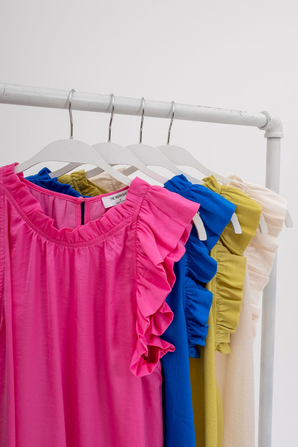 Sleeveless Ruffle Trim Blouse