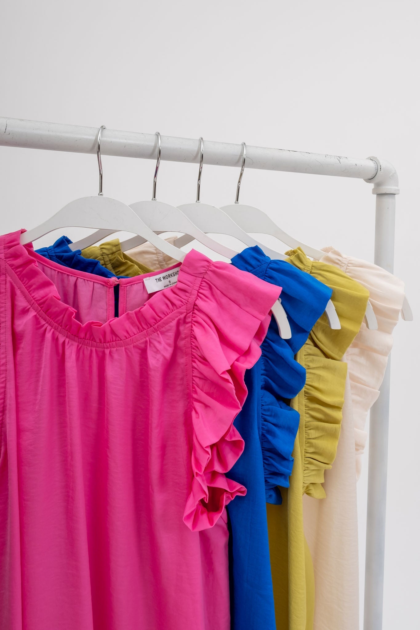 Sleeveless Ruffle Trim Blouse