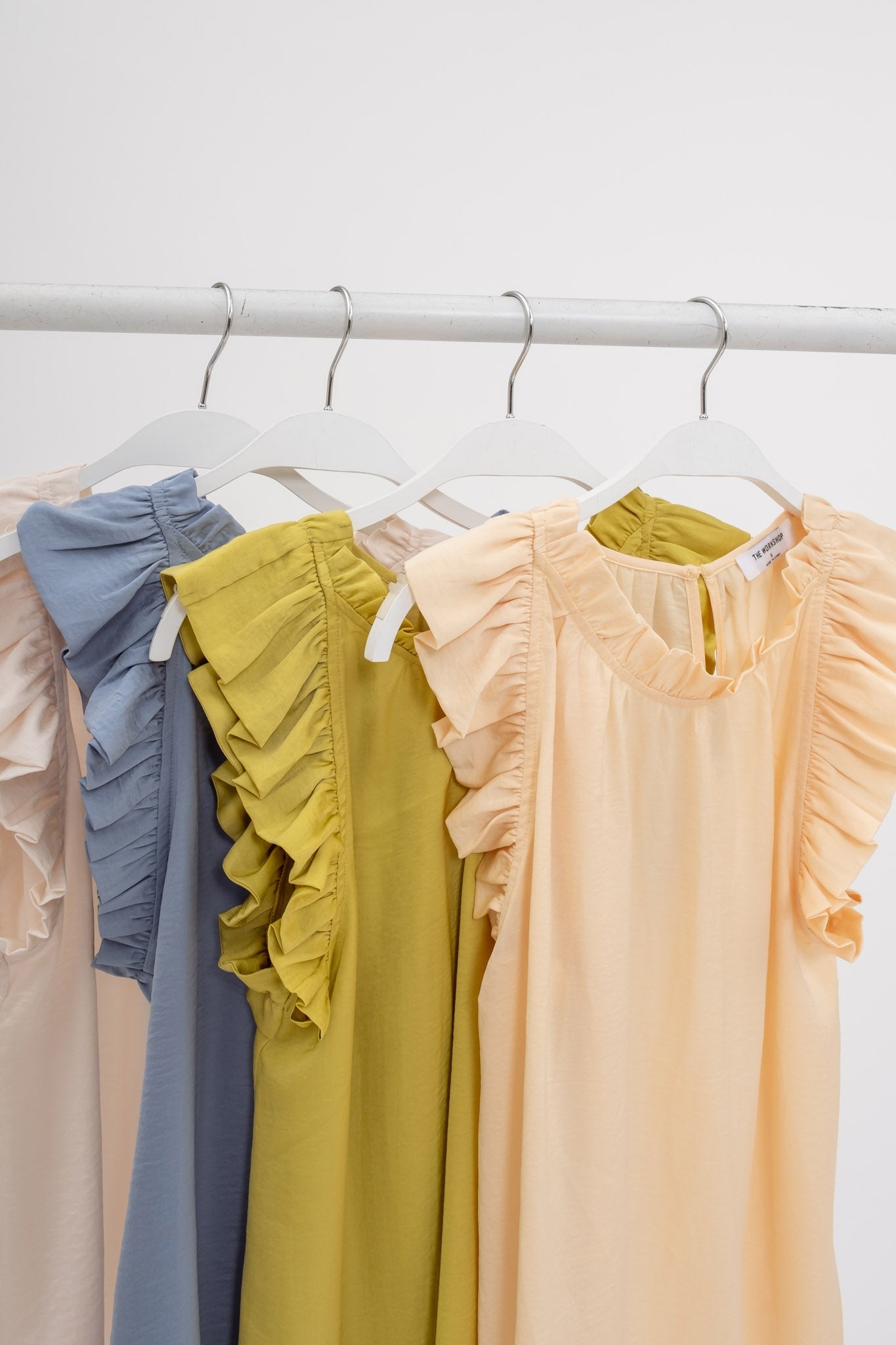 Sleeveless Ruffle Trim Blouse